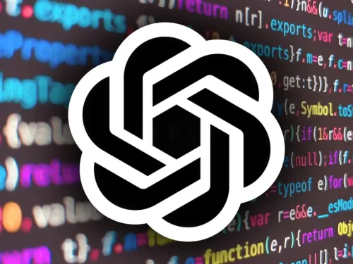 Logotipo preto e branco em frente a uma tela com código colorido.